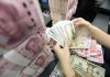 Aumento das taxas de juro nos EUA deve acelerar saída de capital da China, dizem analistas