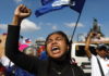 Mais de um milhar de Filipinos assinala revolução que afastou pai do actual Presidente