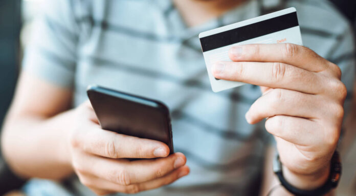 Online banking concept - Modern use of smartphone, making online on the go payments with mobile device